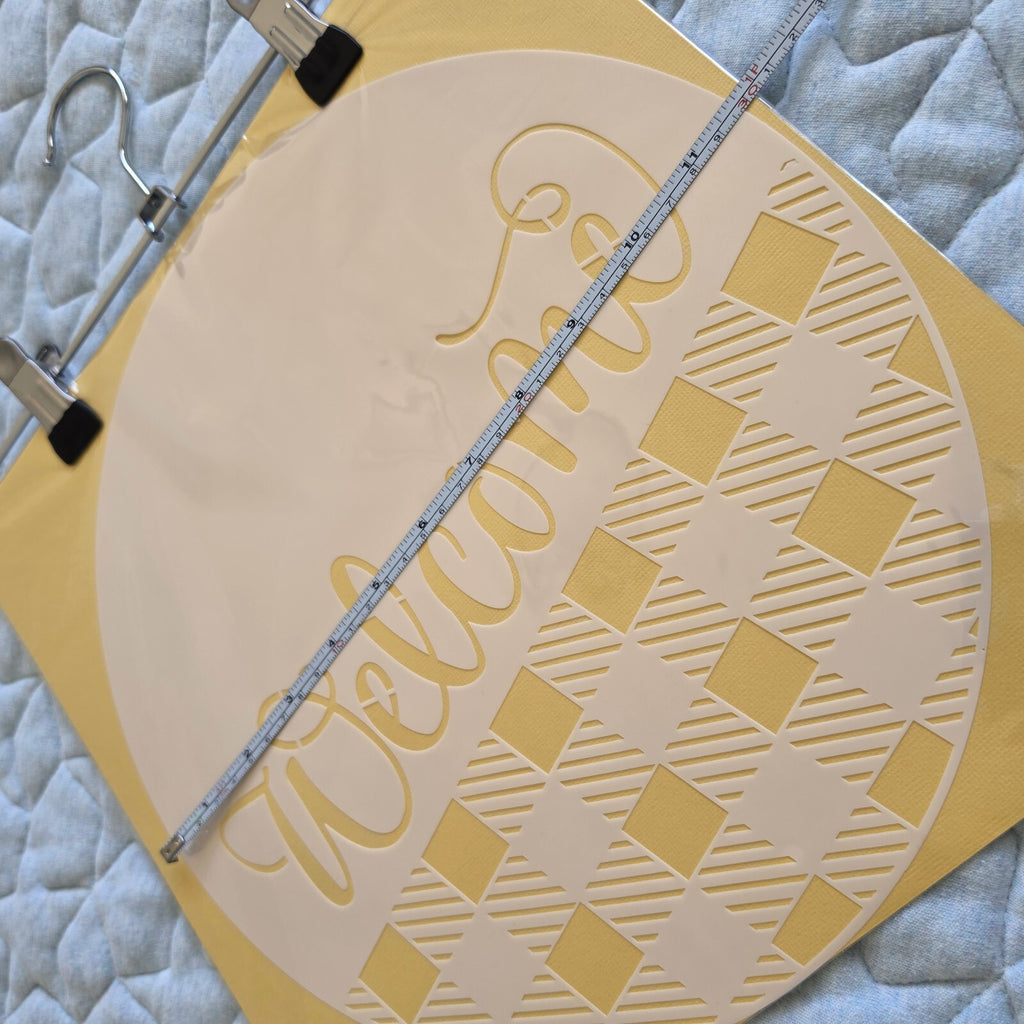 Round Welcome Sign Stencil with Checkerboard Pattern